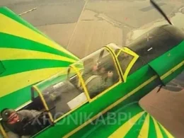 A Ukrainian Yakovlev Yak-52 with a backseat anti-drone gunner.