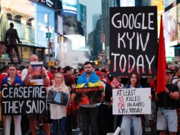 Activists gather at Times Square in a demonstration to remind about Russia's aggression against Ukraine after the recent 17 June strike killed 28 civilians and injured over 100.
