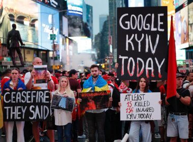 Activists gather at Times Square in a demonstration to remind about Russia's aggression against Ukraine after the recent 17 June strike killed 28 civilians and injured over 100.