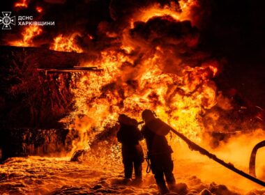 Russian evening strike on Chuhuiv in Kharkiv Oblast sparked two major fires—one at a unspecified city facility that rescue teams battled for hours, and another at the local post office that spread to nearby homes and vehicles.