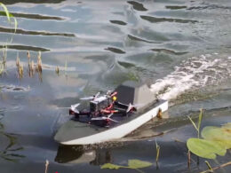 ukraine unveils ursula river drone kamikaze mode — flying onboard ukrainian unmanned riverine surface developed novitechnet carrying uav 2025 youtube/association engineers ukrainian-riverine-surface-drone-ursula-carrying-a-uav its multi-function build meant complex sabotage operations dense
