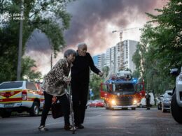 AN elderly couple in Kyiv on the morning of 4 July 2025 after a massive Russian air attack. Photo: Kyiv DSNS